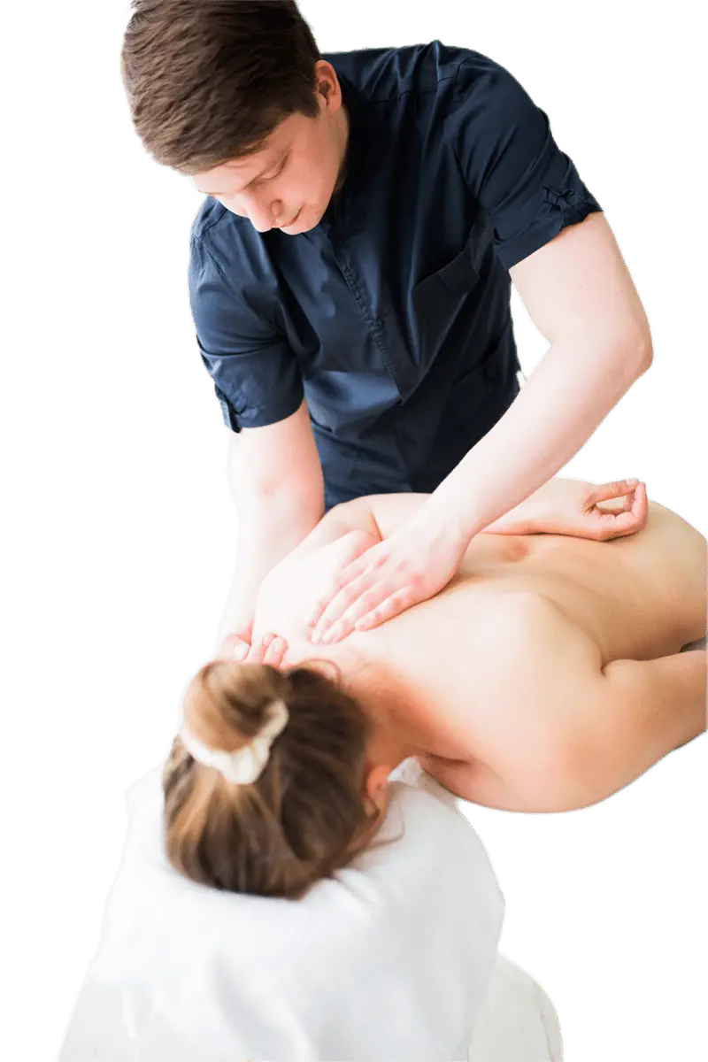 Therapist using hands-on postural and remedial techniques